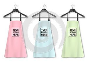 Vector cotton kitchen apron icon set with clothes hangers closeup on white background. Pastel colors. Design