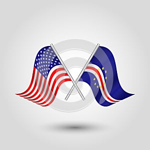 Vector crossed american and verdean flags on silver sticks - symbol of united states of america and cape verde