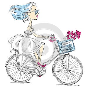 Vector cute girl rides a bicycle photo