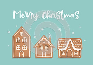 Vector doodle Christmas card with gingerbread houses on blue background