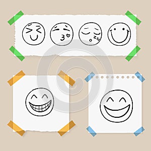 Vector Doodle Hand Drawn Smiley Faces on Paper Pieces Attached by Colorful Tape, Set.