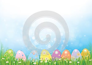 Vector Easter eggs in green grass.