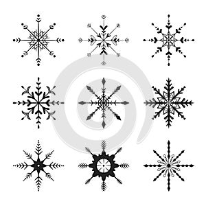 Vector flat illustration. Set of New Year and Christmas black snowflakes icons. Background decoration.