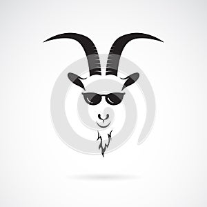 Vector of goat head wearing sunglasses on white background. Wild Animals. Easy editable layered vector illustration