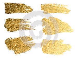 Vector gold paint smear stroke stain set. Abstract gold glitteri