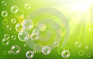 Vector green spring background with sun, soap bubbles