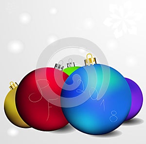 Vector greeting card with inscription pf 2018 and a few colored christmas globes