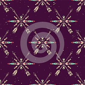 Vector grunge seamless pattern with crossed ethnic arrows and tribal ornament