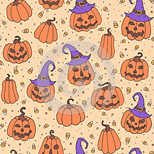 Vector Halloween seamless pattern with candy corns, smiling pumpkins and witch hats on the yellow dotted background