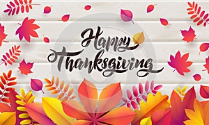 Vector Hand drawn Happy Thanksgiving typography poster with fallen leaves on wood background
