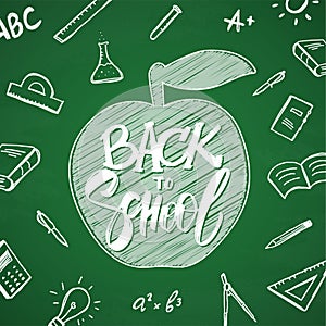 Vector hand drawn lettering of Back to School with apple and doodles supplies on chalkboard background.