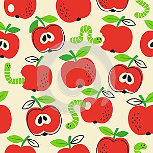 Vector hand drawn seamless pattern in a doodle style. Red apples and caterpillar on yellow background