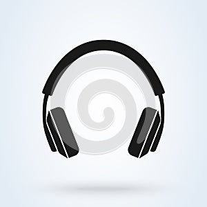 Vector headphones icon. Black symbol silhouette isolated on modern background