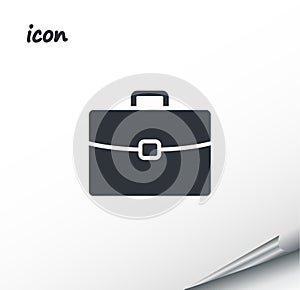 Vector icon briefcase on a wrapped silver sheet