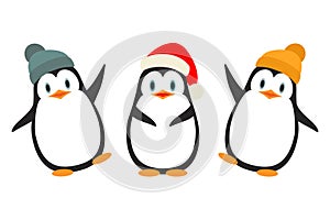 Vector illustration. Collection of cute little penguins in hats, isolated on white. Winter animal clipart in flat style.