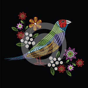 Vector illustration embroidery stitches with gouldian finch, chamomile wildflowers, spring flowers, branches in color. Fashion or