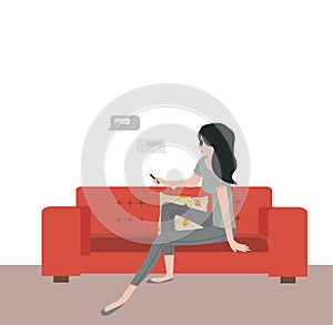 Woman sitting on sofa with messaging