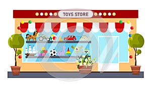 Vector illustration of funny toy store. Cartoon urban buildings with soft toys, cars, ships, balls, decorated with flower pots