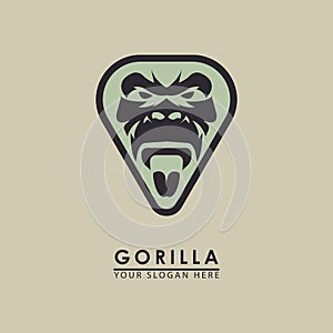 vector illustration of a gorilla roaring in a triangle for a logo icon