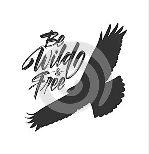 Vector illustration: Handwritten brush lettering of Be Wild and Free with silhouette of flying hawk