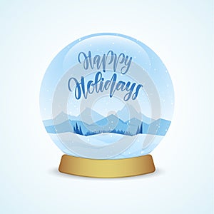 Happy Holidays. Snow globe with winter mountains landscape isolated on light blue background.