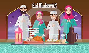 Happy moslem family celebrate for eid mubarak with plentiful food and lantern photo