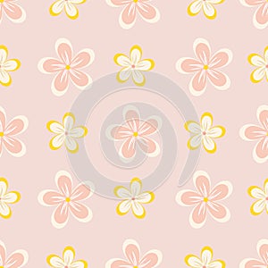 Vector illustration of plumeria tropical flowers seamless repeat pattern on a light pink background.