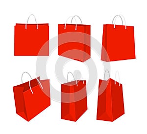 Vector illustration set of red shopping bags, paper or plastic with handles isolated on white background.