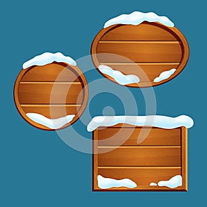 Vector illustration. Set of snow covered wooden signs with frames isolated on a blue background.