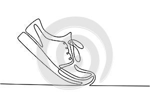 Vector illustration of sneakers. Sports shoes in a line style. Continuous one line drawing minimalism design