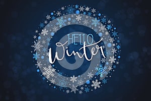 Vector illustration of winter banner template with hand lettering label - hello, winter - with circle of snowflakes