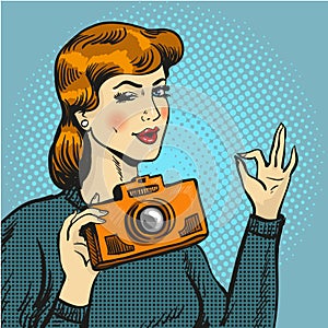 Vector illustration of woman taking photo in pop art style.