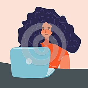 Vector illustration of a woman with wavy hair who is sitting at a table and working on a laptop.