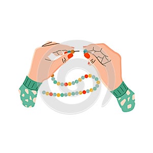 Vector illustration of women`s hands with beads and stringing on a string. The manufacture of beads. Hands of a needlewoman