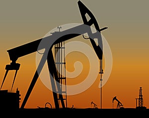 Vector image of oil derricks on the ground