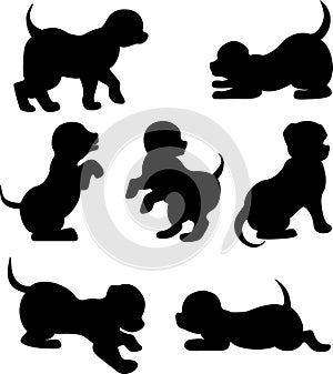 Vector image of silhouettes of playing puppies