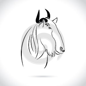 Vector image of an wildebeest head design on the white background