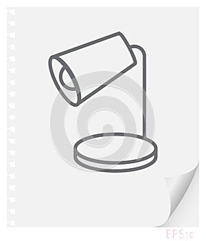 Vector linear illustration of a desk lamp on a sheet of paper with a curved corner and holes from springs, a school line icon