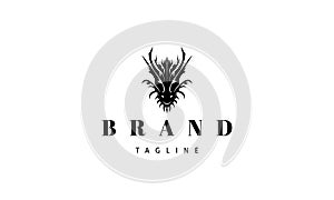 Vector logo on which an abstract image of a dragon head.