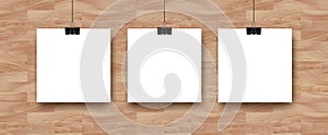 Vector Mockup with three empty white square sheet of paper, posters on natural wooden background. Trendy portfolio white