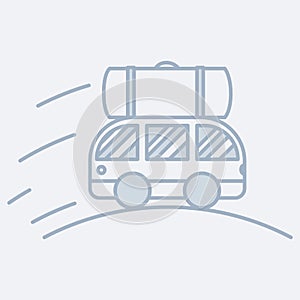 Vector modern icon of a driving minibus with cargo on its roof. It represents a concept of travelling, road adventures and fun