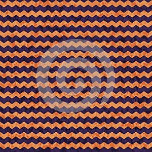 Vector orange zig zag pattern on the dark purple background. Halloween design.