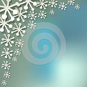 Vector paper Snowflakes in the corner on a blue bokeh fog background.