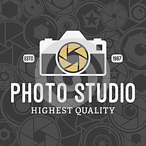 Vector Photo Studio Logo over Camera Shutter and Lenses Pattern