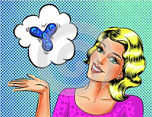 Vector pop art beautiful young woman showing fidget spinner toy