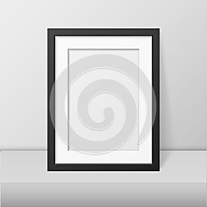 Vector realistic blank black picture frame closeup standing on white table. Design template, mockup. Stock vector
