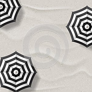 Vector realistic illustration of white sand beach and black white striped umbrellas. Top view summer vacation background