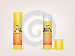 Vector realistic yellow tubes of glue stick
