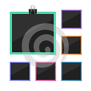 Vector photo frames sticked with tape and hanged on paper clip. Retro fotos. Dark background. photo