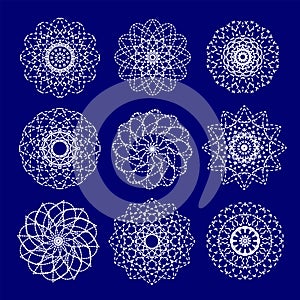 Vector round light white snowflakes geometric patterns on a blue background